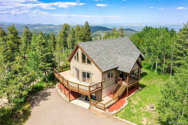 10436 Jeanette Ct, Morrison, CO 80465 - aerial view of property and surrounding area with a forest