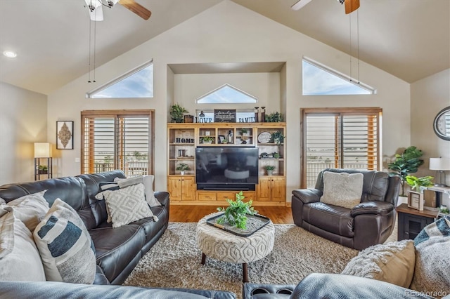 11624 Dunrich Rd, Parker, CO 80138 - living room with ceiling fan, high vaulted ceiling, and wood finished floors