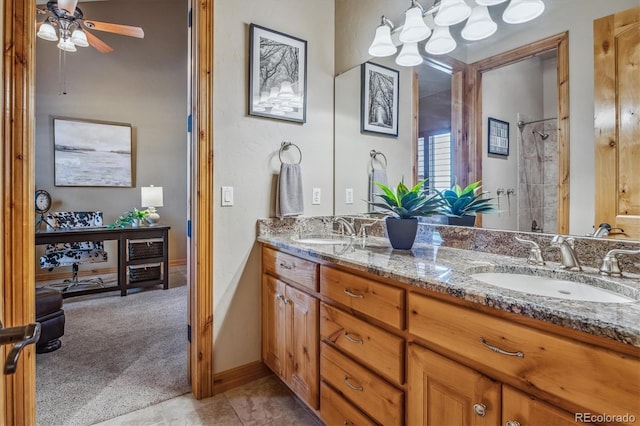 11624 Dunrich Rd, Parker, CO 80138 - bathroom with double vanity, a ceiling fan, and a shower