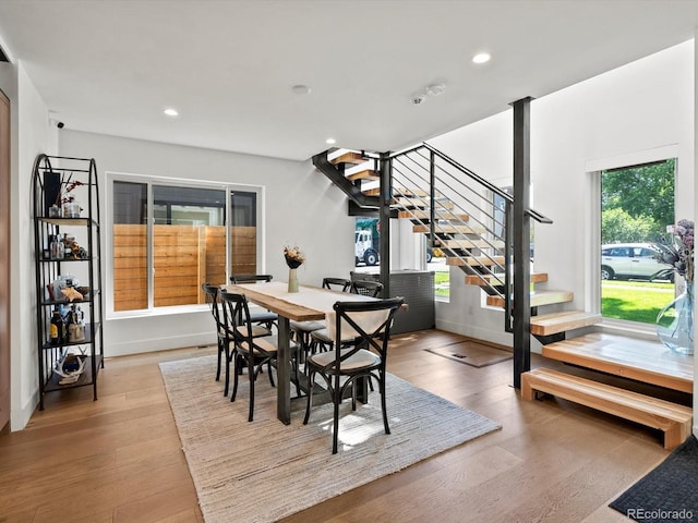 1612 Wolff St, Denver, CO 80204 - dining room featuring stairway, wood finished floors, and recessed lighting