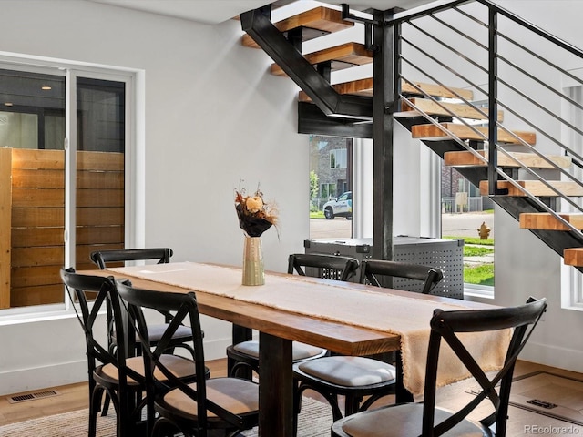 1612 Wolff St, Denver, CO 80204 - dining space with stairway and wood finished floors