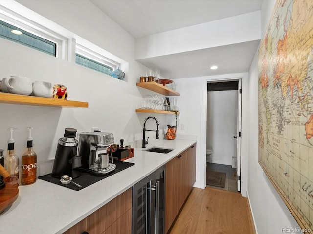 1612 Wolff St, Denver, CO 80204 - indoor wet bar with wine cooler and light wood-style flooring