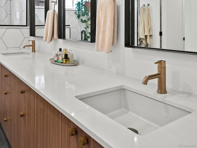 1612 Wolff St, Denver, CO 80204 - full bath with double vanity and tasteful backsplash