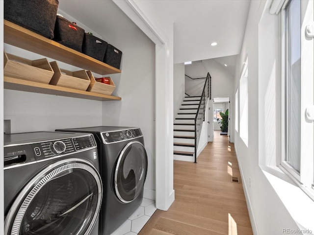 1612 Wolff St, Denver, CO 80204 - laundry area featuring washing machine and clothes dryer, light wood-type flooring, and recessed lighting
