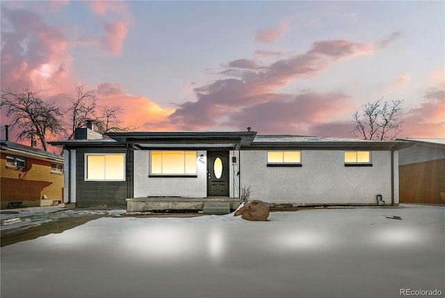 view of front of home with a patio area