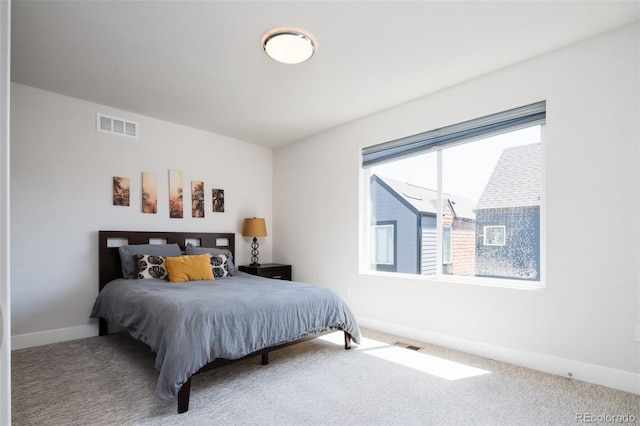 5630 W 11th Pl, Lakewood, CO 80214 - bedroom featuring carpet floors and baseboards