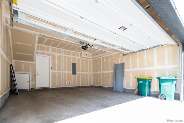 5630 W 11th Pl, Lakewood, CO 80214 - garage featuring electric panel and a garage door opener