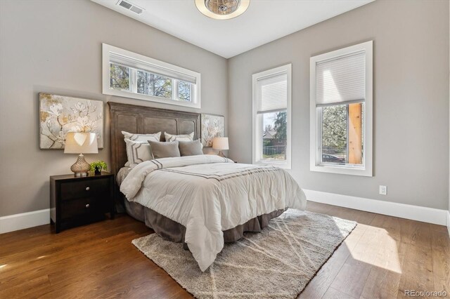 2600 S Adams St, Denver, CO 80210 - bedroom with wood finished floors and baseboards