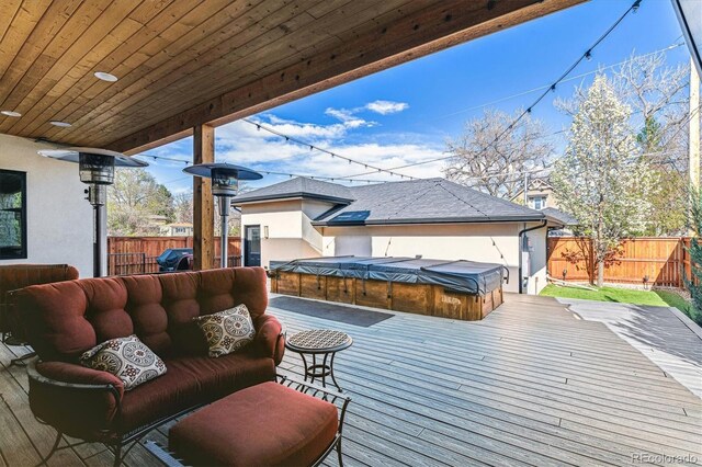 2600 S Adams St, Denver, CO 80210 - wooden terrace with a covered hot tub and a fenced backyard