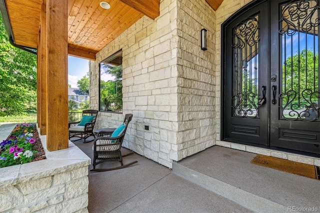 2600 S Adams St, Denver, CO 80210 - view of exterior entry with french doors and covered porch