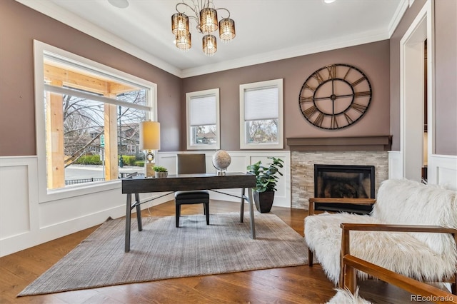 2600 S Adams St, Denver, CO 80210 - office area with a wainscoted wall, a glass covered fireplace, wood finished floors, ornamental molding, and a chandelier