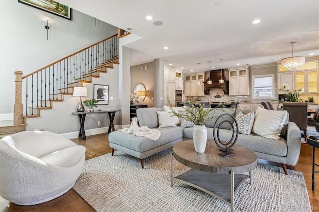 2600 S Adams St, Denver, CO 80210 - living area with recessed lighting, stairs, wood finished floors, and a chandelier