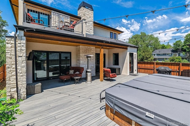 2600 S Adams St, Denver, CO 80210 - wooden deck featuring a grill and a hot tub