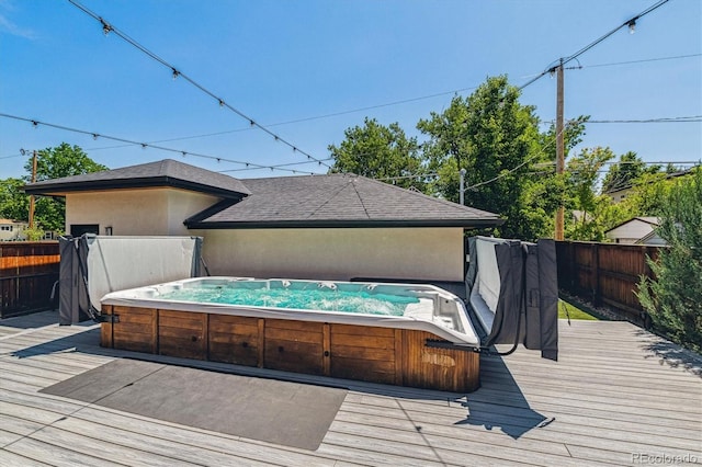 2600 S Adams St, Denver, CO 80210 - wooden deck with a hot tub and a fenced backyard