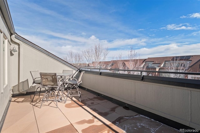 view of patio with a balcony