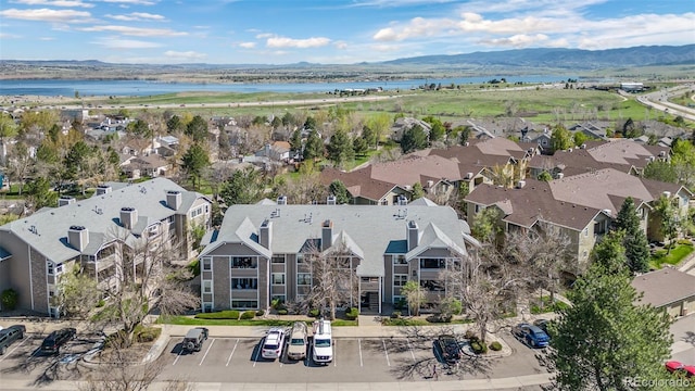 8378 S Upham Way Unit B305, Littleton, CO 80128 - aerial perspective of suburban area featuring a water and mountain view