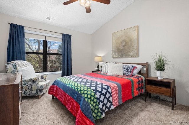 8378 S Upham Way Unit B305, Littleton, CO 80128 - bedroom featuring carpet floors, lofted ceiling, a textured ceiling, and a ceiling fan