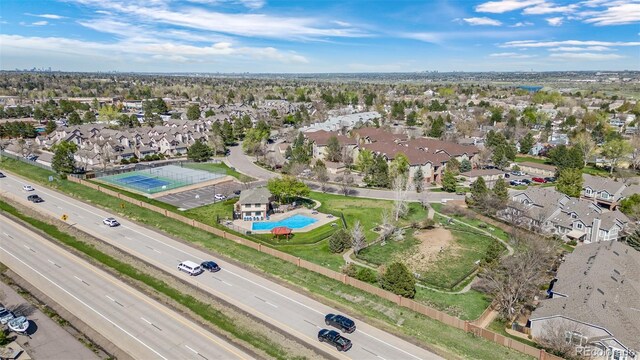 8378 S Upham Way Unit B305, Littleton, CO 80128 - aerial perspective of suburban area featuring a pool and a highway