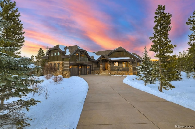 log cabin featuring a garage