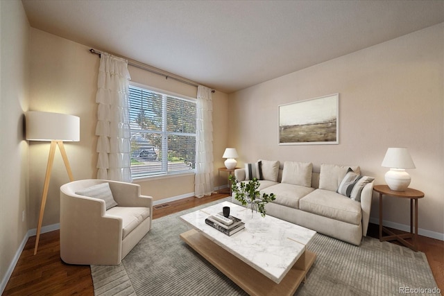 6317 Ruby Hill Dr, Erie, CO 80516 - living area featuring baseboards, wood finished floors, and visible vents