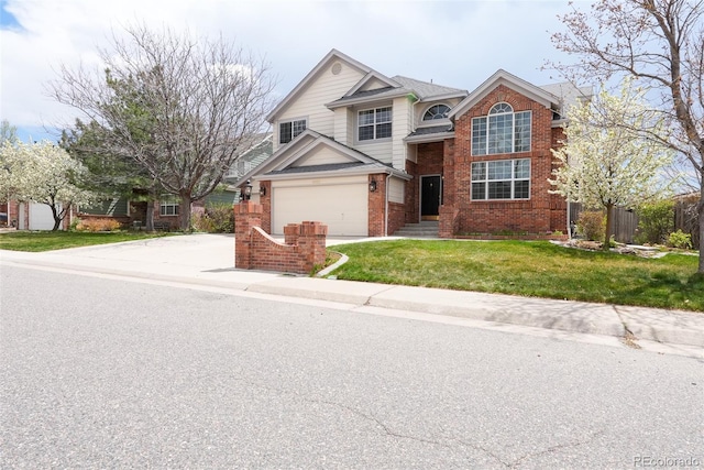 18112 E Dorado Ave, Centennial, CO 80015 - traditional home with brick siding, driveway, and a garage