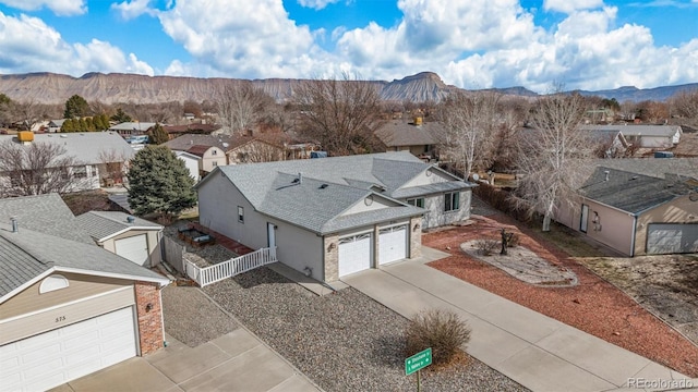 bird's eye view with a mountain view and a residential view