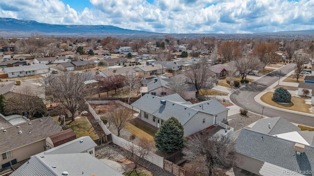 drone / aerial view with a mountain view and a residential view