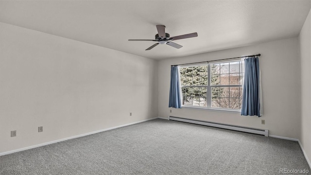 unfurnished room featuring a baseboard radiator, carpet flooring, a ceiling fan, and baseboards