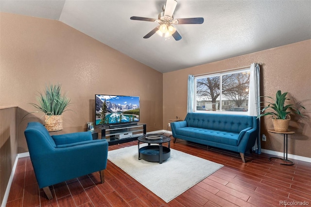 living room featuring ceiling fan, lofted ceiling, and dark hardwood / wood-style floors