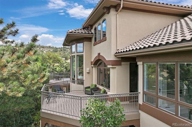 view of property exterior featuring a balcony