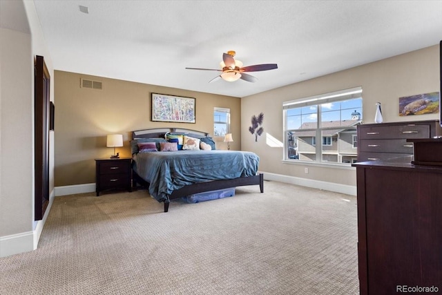 4236 Frederick Cir, Longmont, CO 80503 - bedroom with baseboards, light colored carpet, and ceiling fan