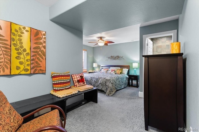 4236 Frederick Cir, Longmont, CO 80503 - bedroom with carpet floors, a ceiling fan, and baseboards