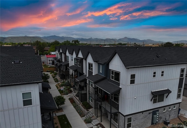 5189 Vivian St, Wheat Ridge, CO 80033 - aerial view at dusk of a mountain view and a residential view