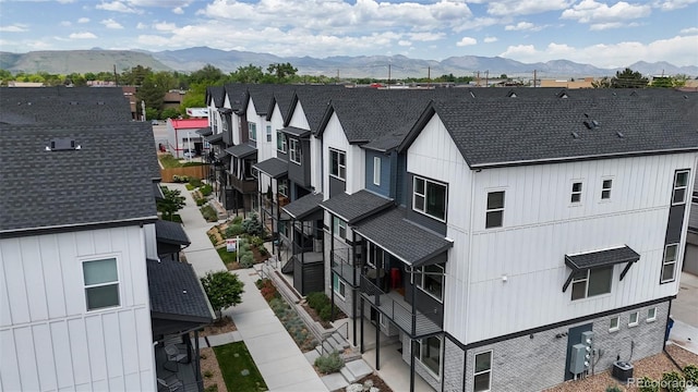 5189 Vivian St, Wheat Ridge, CO 80033 - aerial view of residential area featuring a mountain backdrop