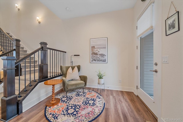 5189 Vivian St, Wheat Ridge, CO 80033 - living area featuring wood finished floors and stairs