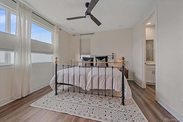 5189 Vivian St, Wheat Ridge, CO 80033 - bedroom featuring wood finished floors, a ceiling fan, and ensuite bath