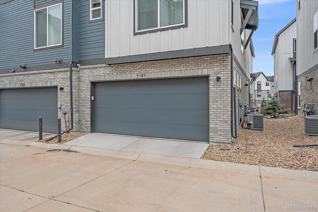 5189 Vivian St, Wheat Ridge, CO 80033 - garage featuring concrete driveway