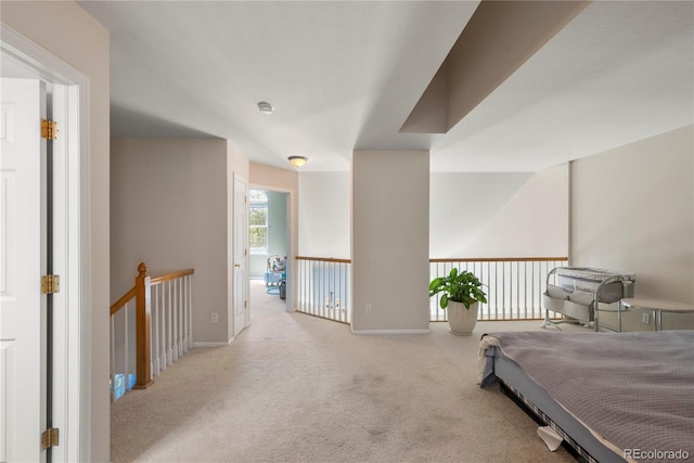 bedroom with carpet and baseboards