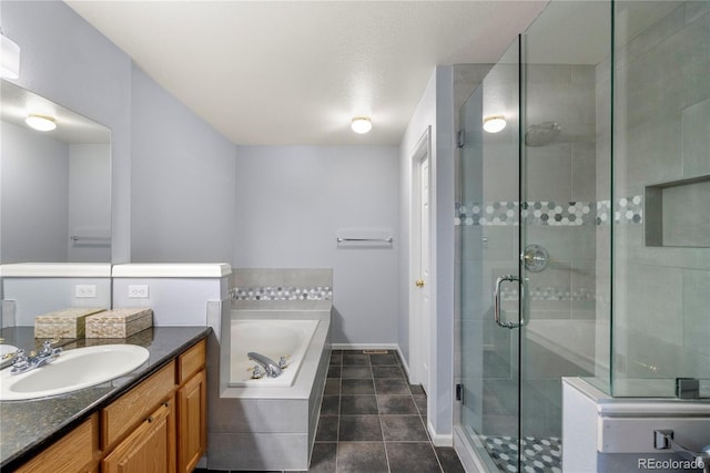 full bathroom with vanity, a bath, a stall shower, and tile patterned flooring