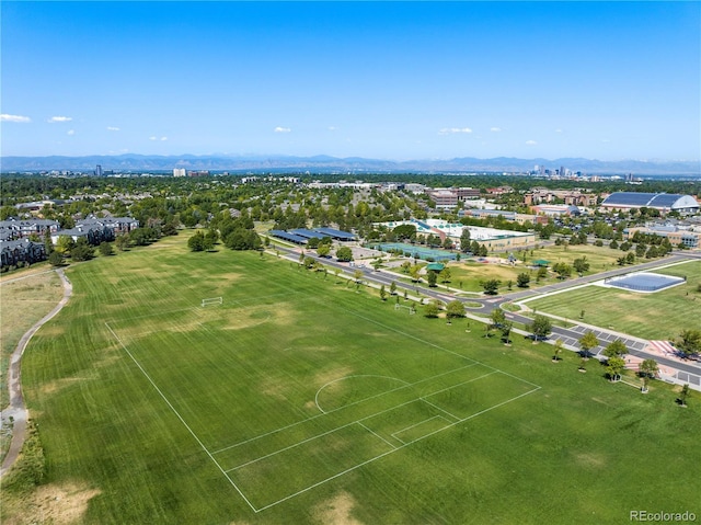 birds eye view of property featuring a mountain view