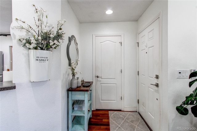 21418 E Stroll Ave, Parker, CO 80138 - foyer featuring wood finished floors