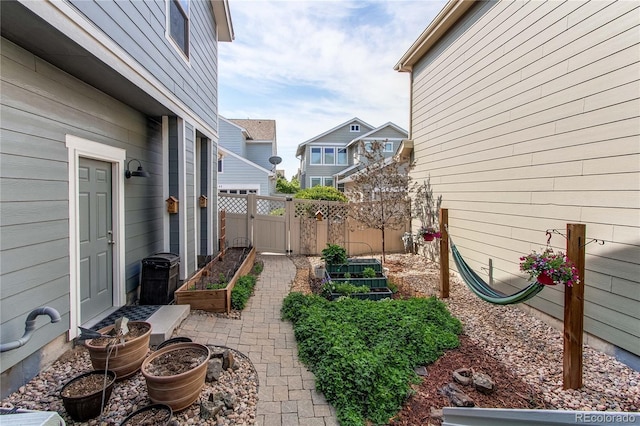 21418 E Stroll Ave, Parker, CO 80138 - view of patio / terrace featuring a garden