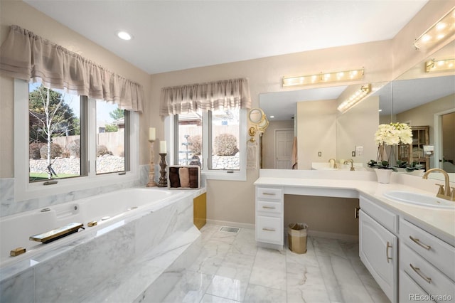 full bath featuring marble finish floor, a sink, double vanity, baseboards, and a bath