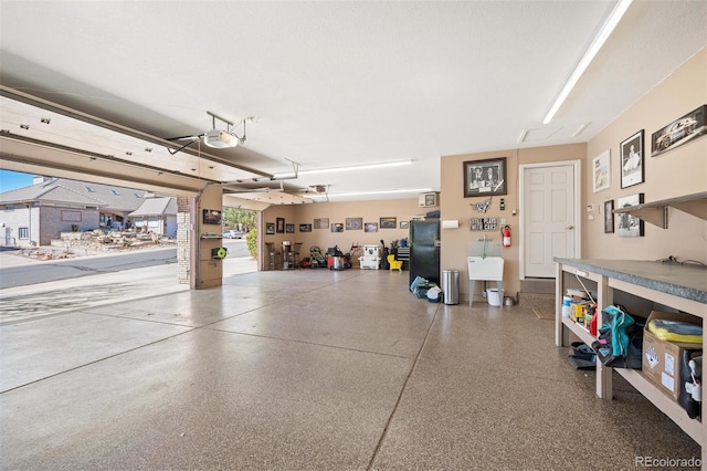 garage featuring a garage door opener