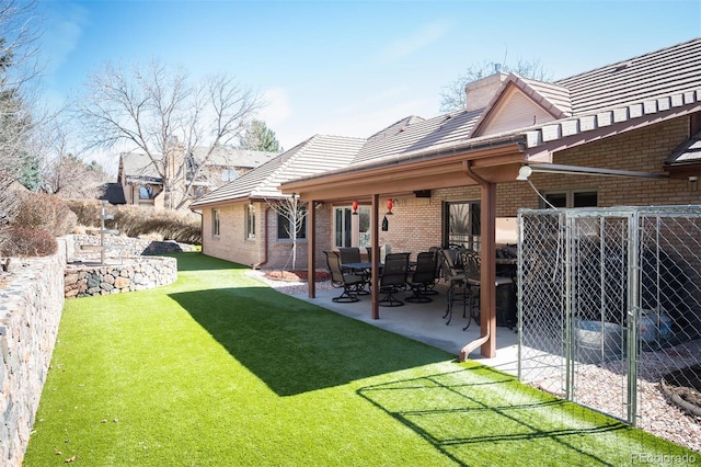 view of yard featuring a patio area and fence