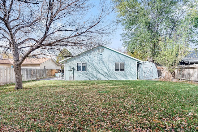 view of outbuilding featuring a fenced backyard