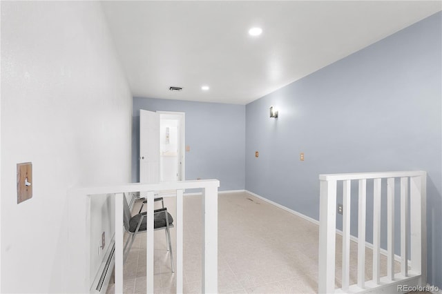 hall featuring recessed lighting, visible vents, and baseboards