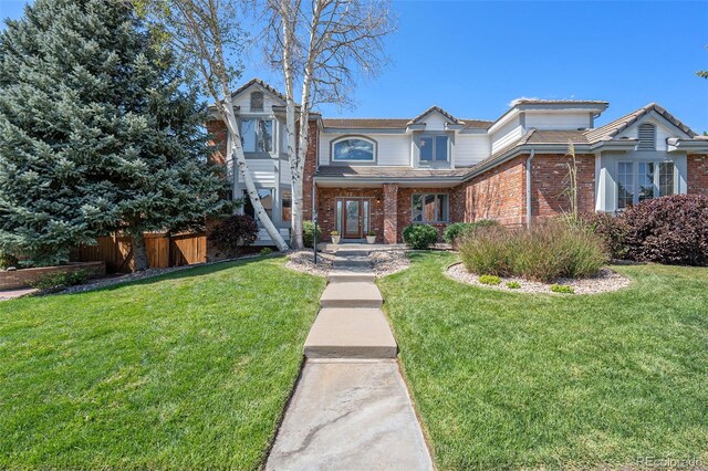 view of front of house featuring a front lawn