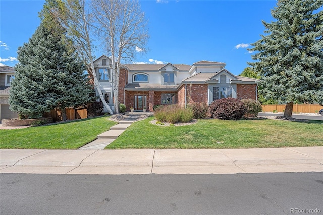 view of front of house featuring a front lawn