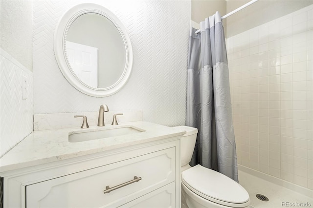 bathroom with a shower with shower curtain, toilet, and vanity